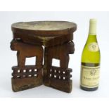 Tribal : An Ethnographic Native Tribal East African Kamba stool, with three feline supports. Approx.