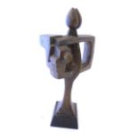 Film / television award : A cast bronze abstract possibly a figure holding a camera on a squared