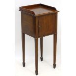 An early 20thC mahogany pot cupboard / bedside cabinet,