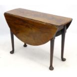 A George I mahogany pad foot table,