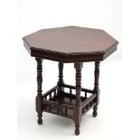 An early 20thC occasional table with octagonal top,