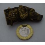 A brass novelty dog vesta CONDITION: Please Note - we do not make reference to the