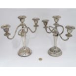 Pair of silver plated candleabra CONDITION: Please Note - we do not make reference