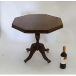 A 20thC octagonal tilt top occasional table CONDITION: Please Note - we do not make