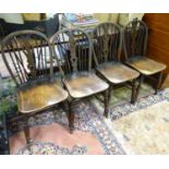 A set of 4 stained elm and beech dining chairs CONDITION: Please Note - we do not
