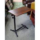 A bed stand / table with telescopic base