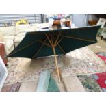 A large patio umbrella sun shade (for patio table ) CONDITION: Please Note - we do