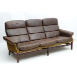 Vintage Retro : a Danish 3 seat sofa with brown leather upholstery ,