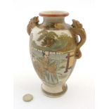 A Japanese Satsuma vase with dragon formed handles,