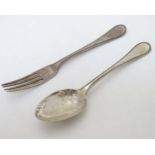 A silver Christening spoon and fork with bead edge.