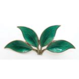 Scandinavian Jewellery : A Norwegian silver gilt brooch of foliate leaf form with green guilloche