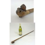 A Folk Art carved ash walking stick / cane, the root ball carved as the head of a boxer dog.