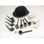 A collection of briar, corn and clay smoking pipes , to include examples by L Fiolet (Belgium),