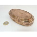 An 18thC oval copper tobacco box with image to top of Lady Godiva on horse back,