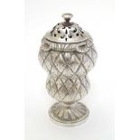 A Geo IV silver pounce pot of stylised thistle form.