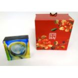 Glass : A boxed Chinese squared glass paperweight with engraved and moulded double headed dragon ,