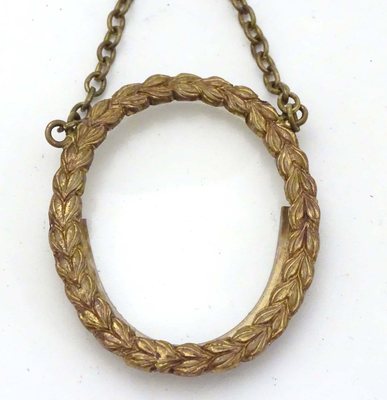 A circa 1900 small oval Victorian brass frame with oval glass and hanging chain , - Image 4 of 5