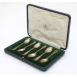 A cased set of 6 silver teaspoons with shell decoration hallmarked London 1922 maker Mappin & Webb