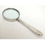 A silver handled magnifying glass 5 1/2" long overall CONDITION: Please Note - we