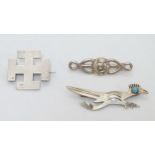 3 various silver brooches comprising one formed as a stylised roadrunner bird with turquoise eye,