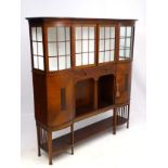 Maple & Co: A mahogany Art Nouveau glazed top bow shaped sideboard 66 1/4 wide x 86 3/4" high x 16"