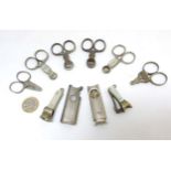 Cigar Cutters : A collection of 12 assorted pendant and scissor formed cigar cutters,