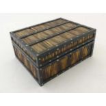 An ebony and bone decorated porcupine quill box.