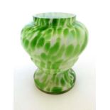 End of day / Spatter glass pot , a green and white pedestal baluster shaped vase 4 1/2” high.