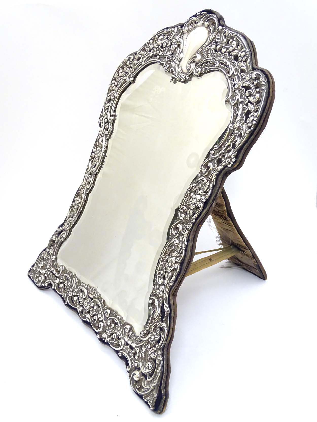 A silver framed easel back mirror,
