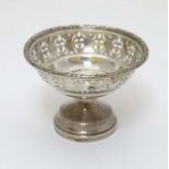 A silver pedestal bon bon dish with pierced decoration.