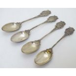 Golfing Interest : 4 silver teaspoons with golf club monogram to handle, crossed clubs and balls.