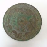 Oriental: Chinese Bronze Mirror : a disc shaped mirror ( now with signs of verdigris ) having