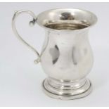 A silver Christening mug hallmarked Birmingham 1945 maker Bishton's Ltd.