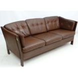 Vintage Retro : A generous Danish brown leather 3 seat sofa with splayed arms ,