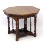 A late 19thC walnut octagonal occasional table with reeded frieze standing on ring turned legs with