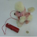 A mid 20thC Yonezawa Japan " Little Fifi" charming poodle moving toy with life like action,