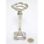 A silver bud vase hallmarked Birmingham 1914 maker W J Myatt & Co.