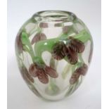 Glass : A glass vase with internal foliate decoration and ground flat foot ,