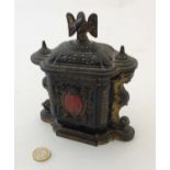 A 19thC polychrome cast iron tobacco jar, the lid with swans to top,