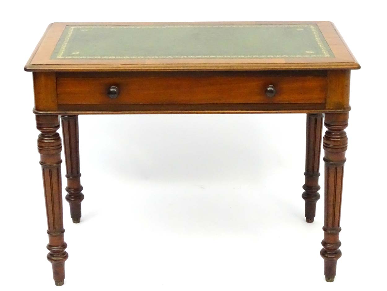 A mid / late 20thC writing desk with single long drawer, - Image 4 of 5