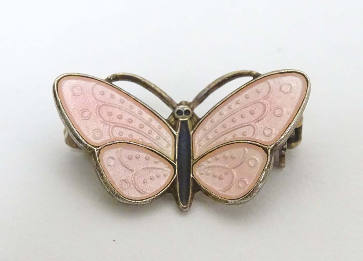 Scandinavian Silver : A Norwegian silver gilt brooch formed as a butterfly with pink guilloche