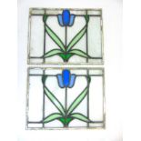 Two stain glass windows with tulip decoration,