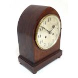 Lancet shaped Mantle clock : a mahogany cased 8 day clock with plated movement striking on a