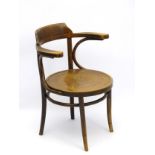 An early 20thC beech bentwood bistro armchair,