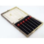 Kitchenalia : a cased set of 1950's 6 cocktail sticks with sterling silver shafts ( marked ) and