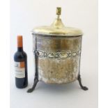 An early 20thC brass lidded three footed coal scuttle of cylindrical form 16" high x 12" diameter