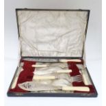 Cased serving items including bread knife, fish servers, pickle fork, butter knife etc.