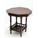 An early 20thC occasional table with octagonal top,