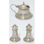 A 3 - piece silver cruet comprising silver mustard pot together with salt and pepper pots with