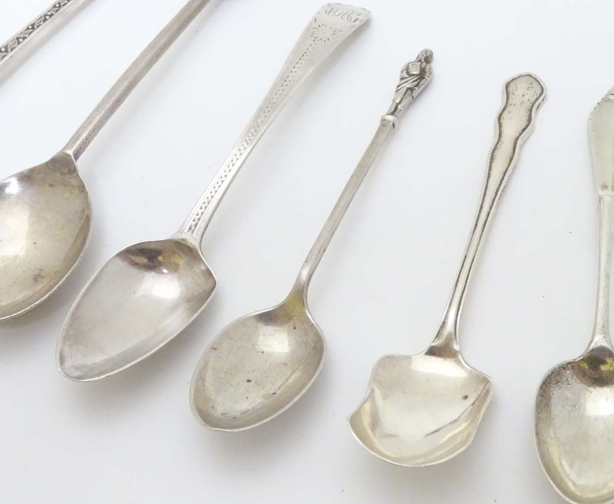 Assorted spoons to include a seal top spoon hallmarked Sheffield 1911 maker Harrods Stores Ltd, - Image 3 of 10